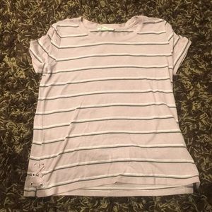 pink t-shirt with white and black strips
